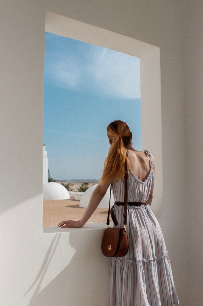 EXPLORING DJERBA IN A STRIPED BOHO DRESS