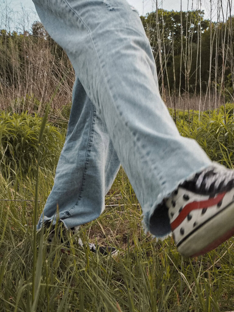 2000s style: wrap top with relaxed fit jeans and gucci boat