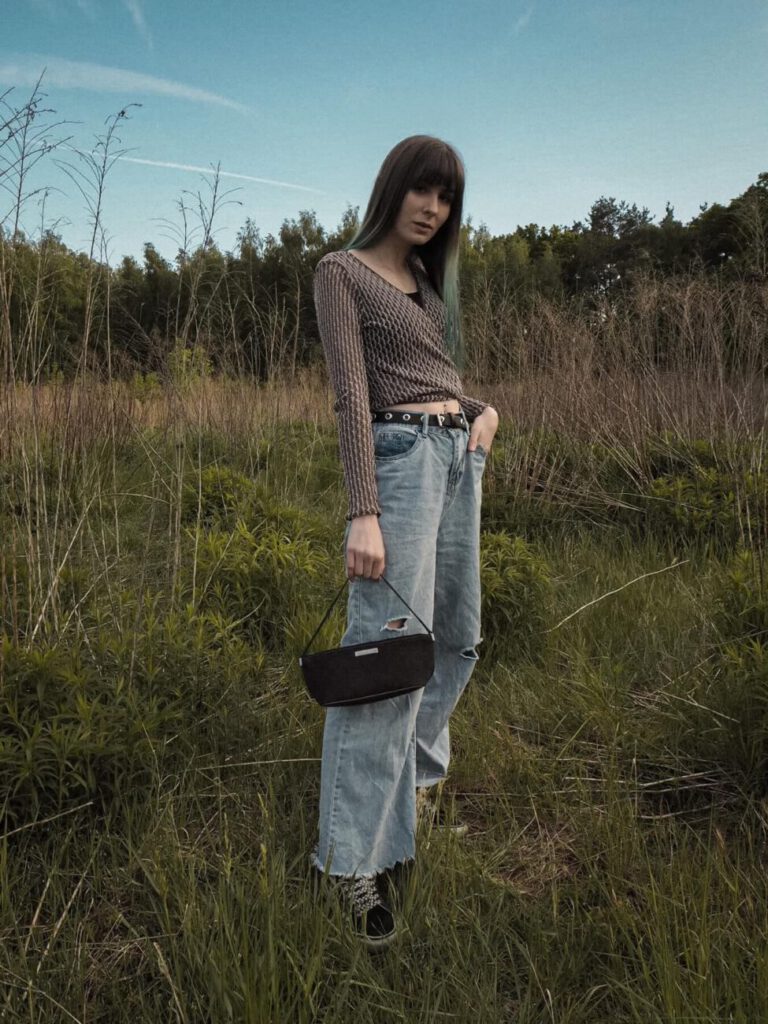 2000s style: wrap top with relaxed fit jeans and gucci boat